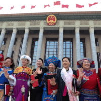 Deputies to the 13th National People's Congress (NPC) leave the Great Hall of the People after the closing meeting of the fourth session of the 13th NPC in Beijing, capital of China, March 11, 2021.