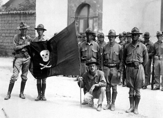 | United States Marines with the captured flag of Augusto César Sandino in 1932 | MR Online