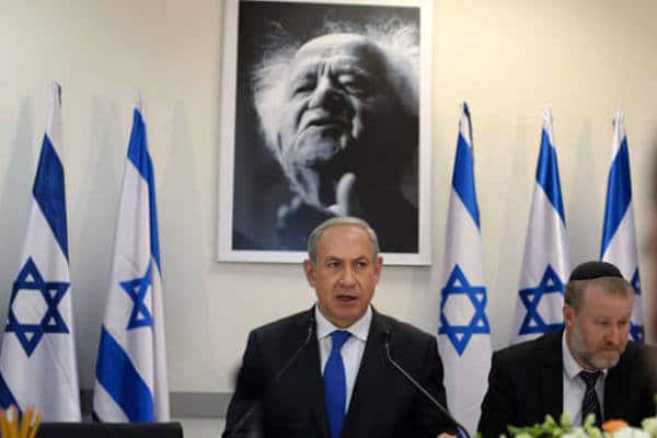 | Prime Minister Benjamin Netanyahu stands in front of a portrait of Israels first Prime Minister David Ben Gurion | MR Online