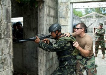 | Joint operations A US Navy master at arms teaches a Philippine Special Forces trainee how to clear a room after boarding a ship US Navy Photo by Jason Tross | MR Online