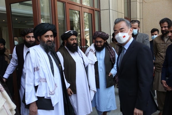 | Chinas State Councilor and Foreign Minister Wang Yi R with Acting Prime Minister of Interim Government Mullah Abdul Ghani Baradar Acting Foreign Minister Amir Khan Muttaqi Kabul March 24 2022 | MR Online