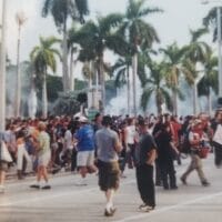 Police used smoke bombs and rubber bullets against free trade agreement protestors in Miami. 2003.