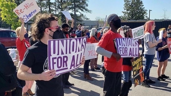 | Labor organizers and trade unions hold a protest outside a Starbucks outlet in Raleigh North Carolina for firing a pro union worker Photo ThriveNCTwitter | MR Online