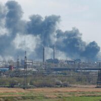 Thick smoke billows from the Azov steel plant on April 20, 2022