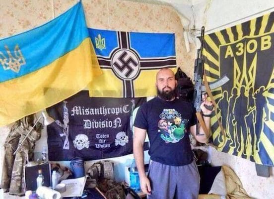 | Azov fighter posing in front of Nazi posters Mariupol Ukraine | MR Online
