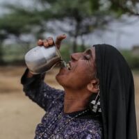 | An Indian woman drinks water on March 29 2022 during a fierce heat wave Image credit UNDP India | MR Online