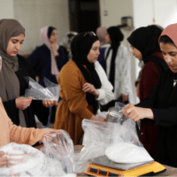 Gaza’s youth come to the aid of their community, amid a burgeoning food crisis in the besieged Gaza Strip. (Photo: Mahmoud Ajjour, The Palestine Chronicle)