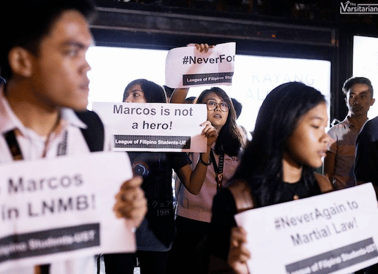 | Students from the University of Santo Tomas and other campuses protest on Espana Avenue in Manila over the dictator Ferdinand Marcos being reburied in the Heroes Cemetery in 2016 Image The VarsitarianAlvin Joseph Kasiban | MR Online