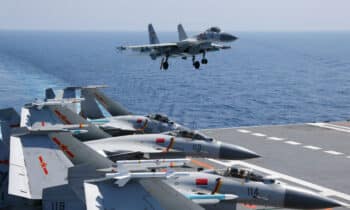 | A ship borne J 15 fighter jet prepares to land at the flight deck of the aircraft carrier Liaoning Hull 16 PhotoChina Military | MR Online