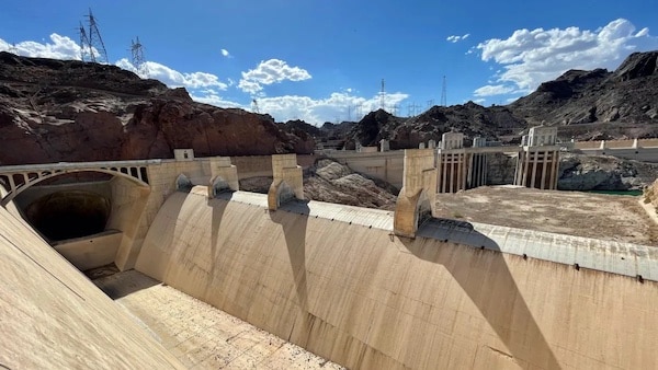 | A giant spillway at Hoover Dam gathers gravel and other debris instead of water as seen on June 28 2022 The dam has two of these concrete lined open channels designed to help funnel overflowing water from Lake Mead around Hoover Dam and out into the Colorado River The spillways havent seen any overflow since the summer of 1983 Image source © Tom Yulsman via waterdeskorg | MR Online