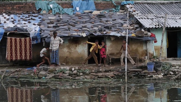 | Children playing in a slum in Allahabad India October 3 2011 Photo AP | MR Online