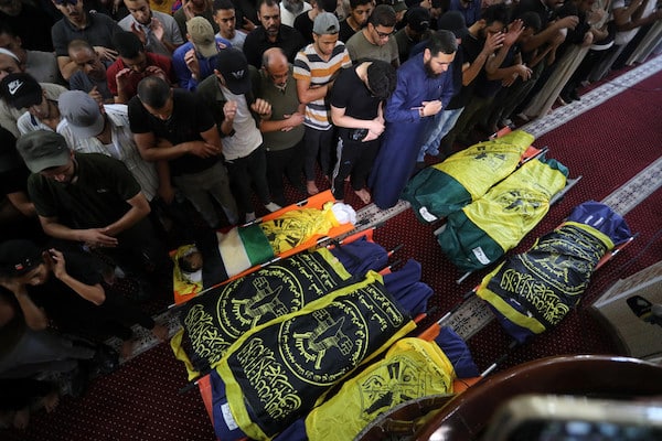 | Mourners attend the funeral of seven Palestinians including Islamic Jihad senior commander Khaled Mansour who were killed in Israeli airstrikes on Rafah in southern Gaza on 7 August 2022 Ashraf Amra APA images | MR Online