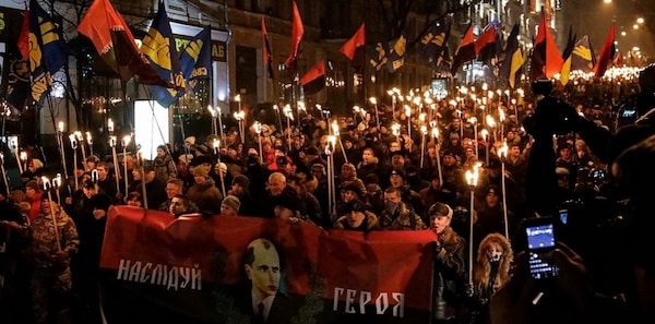 | Supporters of Ukraines far right Svboda and Right Sector parties march on the anniversary of Stepan Banderas birthday in Kiev in 2015 Photo Creative Commons | MR Online