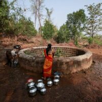 Most often Dalit women are not allowed to take water from a common well, instead having to go further to find water. Representative image credit: Reuters/Danish Siddiqui