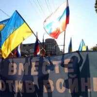 Peace March. The Banner Reads 'Together against the War'—the Message of the Combined Russian and Ukrainian Flags, Moscow, September 21, 2014. Photo by E. Razumnyi/Vedomosti.