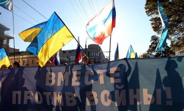 | Peace March The Banner Reads Together against the Warthe Message of the Combined Russian and Ukrainian Flags Moscow September 21 2014 Photo by E RazumnyiVedomosti | MR Online