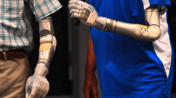 | Two US army veterans Fred Downs and Artie McAuley show off new prosthetic arms developed by DARPA Source rtcom | MR Online