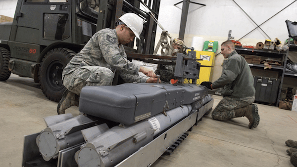 | Airmen with the 3rd Munitions Squadron assemble a rack of inert small diameter bombs during readiness training at Joint Base Elmendorf Richardson Alaska Feb 9 2018 The small diameter bomb is a precise and accurate weapon that allows the the F 22 Raptor to deliver decisive air power US Air Force photo by Alejandro Peña | MR Online