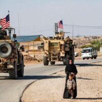 A convoy of US armoured vehicles patrolling the occupied territories of northeastern Syria bordering Turkiye (File photo)
