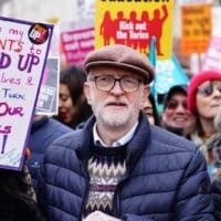 Former Labour party leader Jeremy Corbyn joins members of the National Education Union on a march through Westminster where they are gathering for a rally against the government's controversial plans for a new law on minimum service levels during strikes.