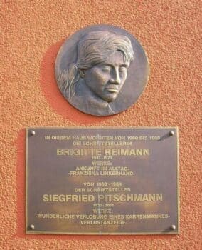 | Plaque on a house at 20 Liselotte Hermann Street in Hoyerswerda recognizing the home of writers Brigitte Reimann and her husband Siegfried Pitchman SeptemberWoman April 12 2012 licensed under the Creative Commons Attribution Share Alike 30 Unported license | MR Online