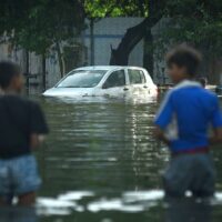 A car is partially submerged after heavy rains in Chennai, India, 12 November 2021.