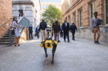 | A four legged robot leads way to visiting Army and state government officials outside new robotics research center on the campus of the University of Texas at Austin Source newsutexasedu | MR Online