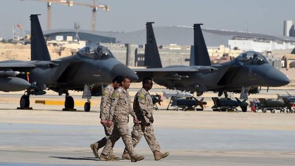 | Saudi army officers walk past US made F 15 fighter jets displayed at King Salman air base in Riyadh Jan 25 2017 AP | MR Online
