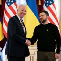 | President Joe Biden L shakes hands with Ukrainian President Volodymyr Zelensky at the Mariinsky Palace in Kyiv on 20 February 2023 AFP | MR Online