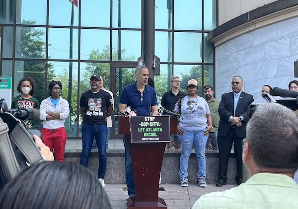| Kamau Franklin of Community Movement Builders and other organizers announce a ballot referendum effort at a June 7 press conference in Atlanta Photo Twitter Micahinatl | MR Online