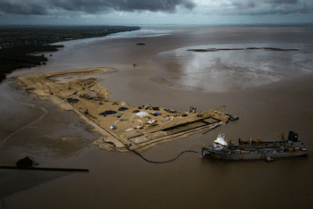 | A ship creates an artificial island to serve as a port for offshore oil production at the mouth of the Demerara River in Georgetown Guyana on April 12 2023 Photo Matias DelacroixAP | MR Online