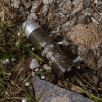 | A cluster bomb capsule is seen on the ground amid the Russia Ukraine war at the frontline city of Avdiivka Ukraine on March 23 2023 Photo Andre Luis AlvesAnadolu Agency via Getty ImagesCommon Dreams | MR Online