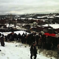 Burials in Račak after the 1999 massacre. [Source: news.bbc.co.uk]