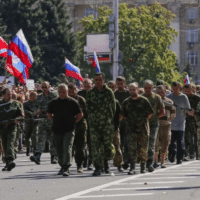 | Donbas separatists escort a column of Ukrainian prisoners of war C as they walk across central Donetsk Ukraine on August 24 2014 Source businessinsidercom | MR Online