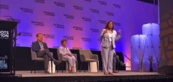 | REP PRAMILA JAYAPAL SAYS THAT ISRAEL IS A RACIST STATE AT NETROOTS NATION ON JULY 15 2023 REPS CHUY GARCIA AND JAN SCHAKOWSKY ARE SEATED BEHIND HER SCREENSHOT FROM YOUTUBE | MR Online