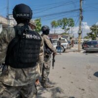 | Police officers patrol a street in the Haitian capital of Port au Prince courtesy Marvens CompèreHaitian Times | MR Online