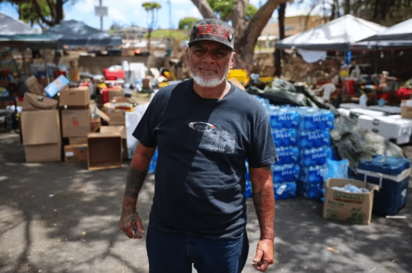| Keʻeaumoku Kapu a Kanaka Maoli community leader and head of the Nā ʻAikāne o Maui Cultural Center handing out supplies in a Lahaina Walgreens parking lot The cultural center was destroyed in the fires | MR Online