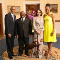 President Barack Obama and First Lady Michelle Obama with Ali Bongo Ondimba, President of Gabon in the Blue Room during a U.S.-Africa Leaders Summit dinner at the White House, Aug. 5, 2014.
