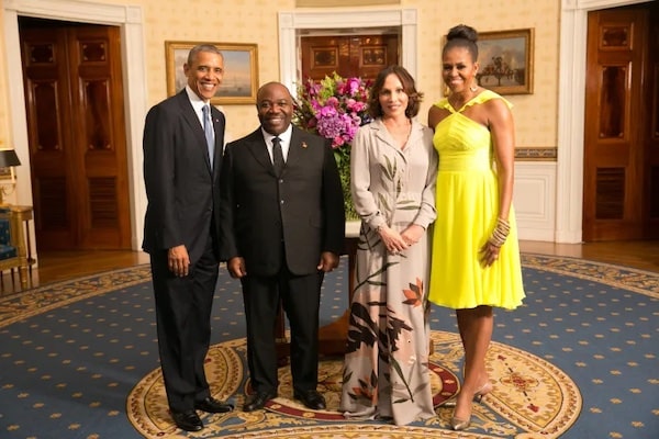 | President Barack Obama and First Lady Michelle Obama with Ali Bongo Ondimba President of Gabon in the Blue Room during a US Africa Leaders Summit dinner at the White House Aug 5 2014 | MR Online