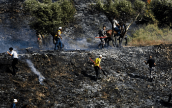 | Palestinians scramble to put out fires set by Jewish settlers in an olive grove near the West Bank village of Burin near Nablus Nasser Ishtayeh | AP | MR Online