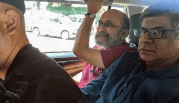 | Newsclick writer Paranjoy Guha Thakurta being taken to the special cell offices by the Delhi Police in connection with the case registered on August 17th under UAPA and other sections of IPC in New Delhi on Tuesday ANI | MR Online