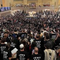 OVER 300 JEWISH NEW YORKERS WERE ARRESTED AT GRAND CENTRAL CALLING FOR A CEASEFIRE IN THE LARGEST CIVIL DISOBEDIENCE NYC HAS SEEN IN 20 YEARS. (PHOTO: JEWISH VOICE FOR PEACE)