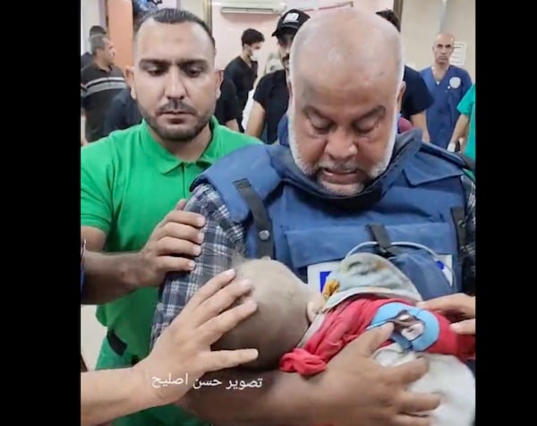 MR Online | Palestinian journalist Wael Dahdouh cradles his child killed by Israel while he was on air October 27 | MR Online
