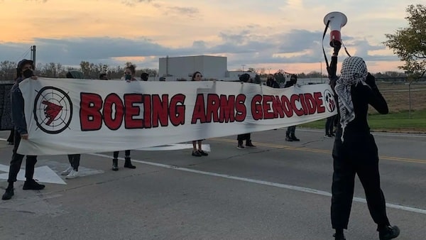 | Young activists blocking the entrances to Boeing Building 598 in Missouri Photo Peyton Wilson | MR Online