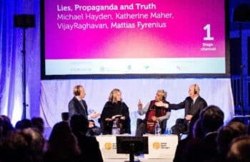 | New WebSummit CEO Katherine Maher seated next to former CIA director Michael Hayden during a Nobel Prize panel discussion | MR Online