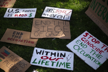 | Signs in support of Palestine are seen at Farragut Square during the National March on Washington for Palestine on Nov 4PHOTO BY ALEX WONG VIA GETTY IMAGES | MR Online
