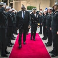 U.S. Secretary of Defense Lloyd Austin and Vice Adm. Brad Cooper arriving in Bahrain for a virtual Red Sea security meeting with representatives of dozens of countries and the E.U. and NATO on Dec 19. (DoD photo by Chad J. McNeeley)