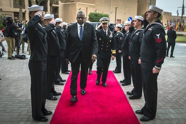 | US Secretary of Defense Lloyd Austin and Vice Adm Brad Cooper arriving in Bahrain for a virtual Red Sea security meeting with representatives of dozens of countries and the EU and NATO on Dec 19 DoD photo by Chad J McNeeley | MR Online