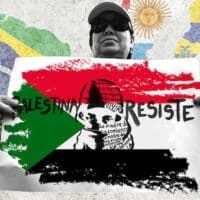 Photo composition showing a protester holding a banner that reads “Palestine resist” on a Palestinian flag, with a background of Latin American flags. Photo: The New Arab.