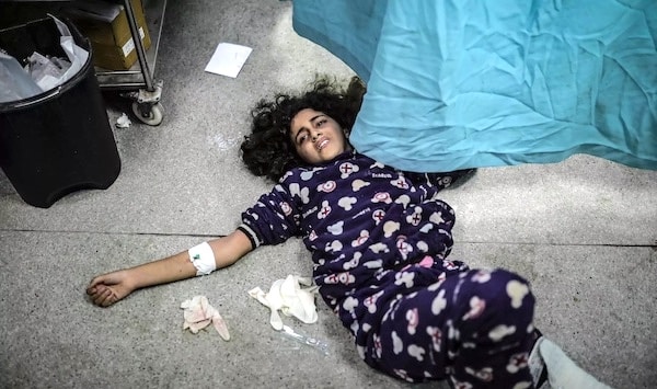 | An injured Palestinian girl lies on the floor of Gazas Nasser Hospital 22 January 2024 Photo Belal Khaled Anadolu via Getty | MR Online